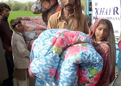 Recipients of blankets and winter aid relief efforts